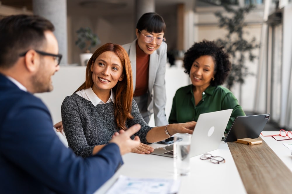 A,Group,Of,Professional,Colleagues,Collaborating,And,Brainstorming,In,A