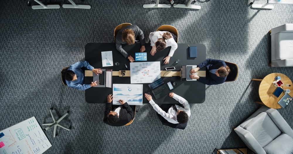 Top,Down,View:,Diverse,Professionals,Working,On,Business,Statistics,Reports